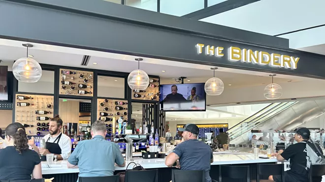 People seated at The Bindery's new airport bar