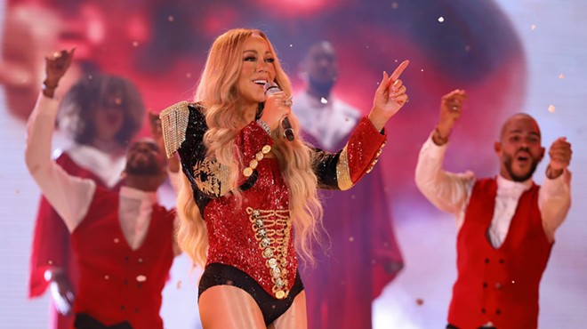 Mariah Carey performing on stage