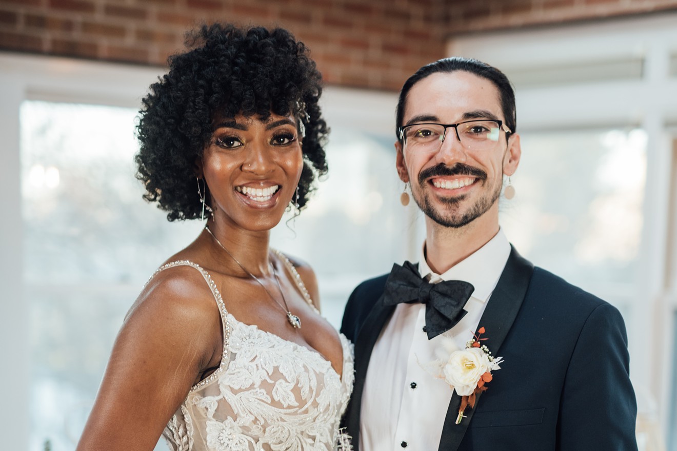 Lauren and Orion pose for wedding portraits moments after tying the knot — and meeting each other for the first time.