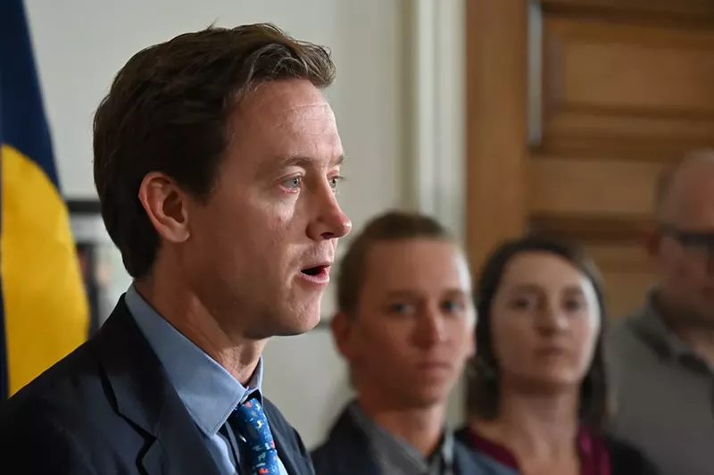 Image: Mayor Mike Johnston talks to the press about his plan to shelter 1,000 people by 2024.
