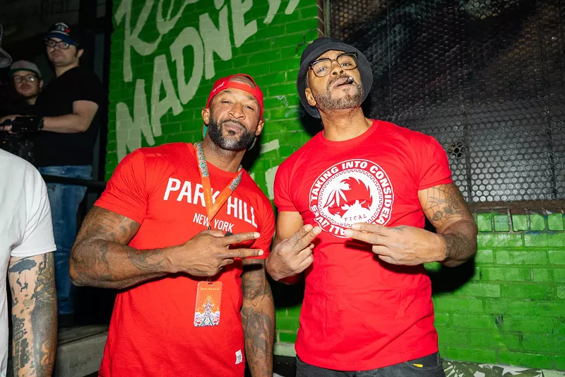 Image: Method Man poses with fan