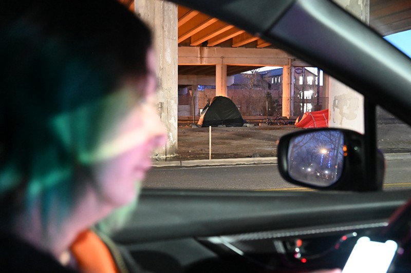 Sabrina Allie, an employee with the Department of Housing Stability, recorded that a homeless resident is living in a tent under an overpass in Sun Valley during the Point in Time count on Tuesday morning.