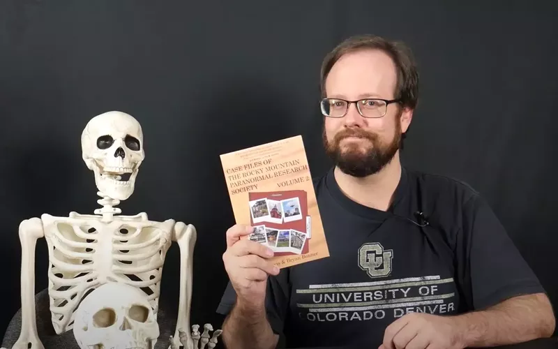 Image: Robert Lewis (R) announcing the debut of volume 2 of Case Files of the Rocky Mountain Paranormal Research Society. (Not co-author Bryan Bonner on the left.)