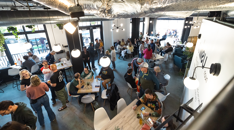Image: Patrons inside a brewery tap room.
