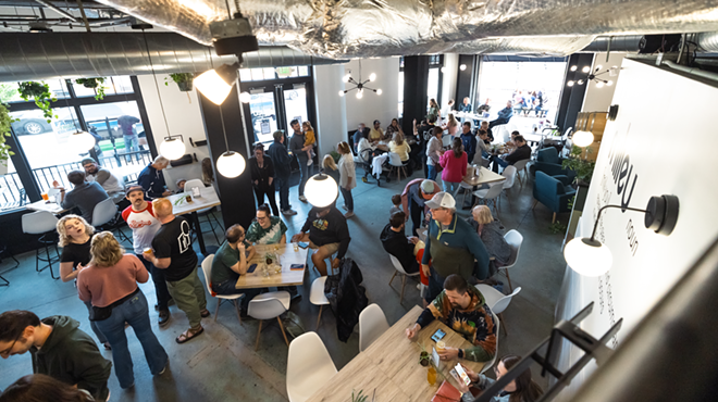 Patrons inside a brewery tap room.