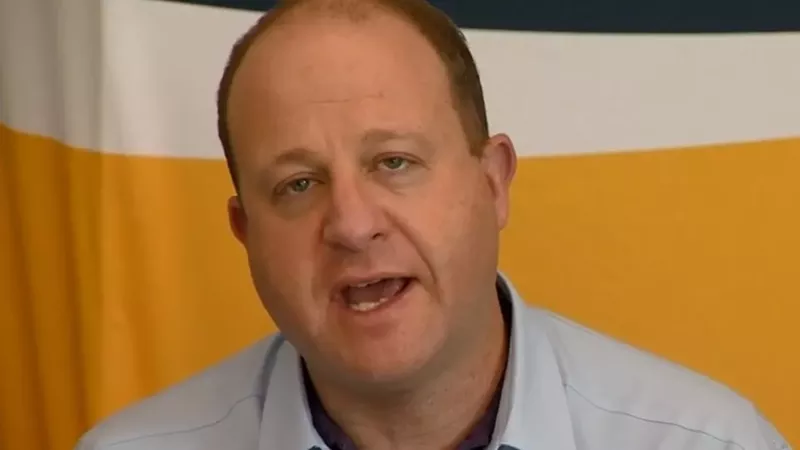 Image: Governor Jared Polis's press release about monkeypox doesn't mention the disease's connection to men sleeping with other men.