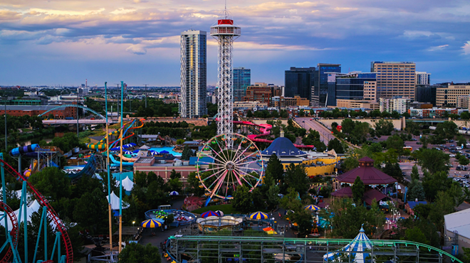 amusement park with Denver skyline.
