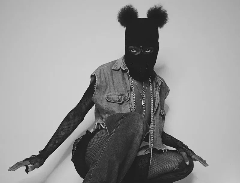 Image: N3ptune wears a mask on the front cover of his new album for a reason.