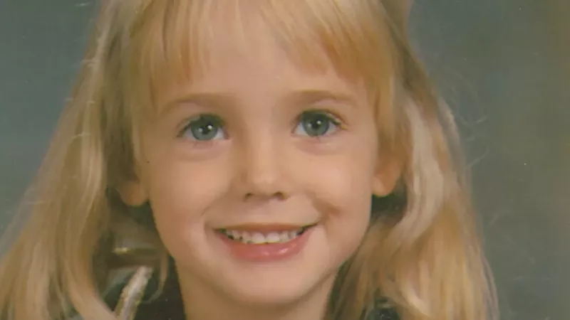 Image: JonBenét Ramsey posing for a school picture.