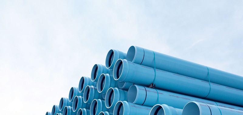 Blue PVC piping awaits installation for Pipelines.