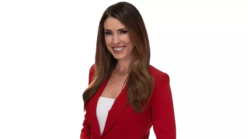 Image: woman with brown hair, red jacket