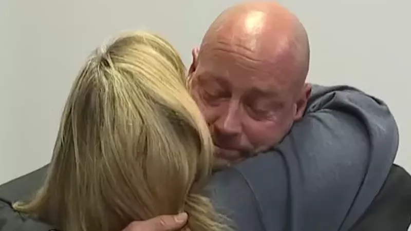 Image: An emotional Douglas County School District superintendent Corey Wise after being fired during a February 4 school board meeting.