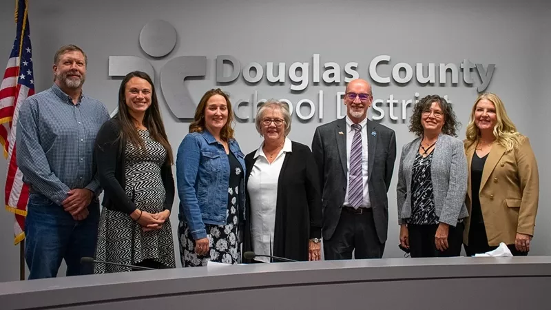 Image: (From left) Douglas County Board of Education members Mike Peterson, Kaylee Winegar, Christy Williams, Becky Myers, David Ray, Susan Meek and Elizabeth Hanson.