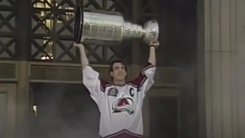 Image: Joe Sakic hoisting the Stanley Cup at the Colorado Avalanche's 1996 victory celebration.