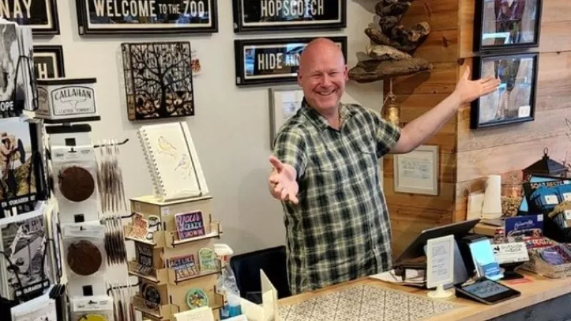 Image: Chris Spears at his Olde Town Arvada store, Outside the Box.