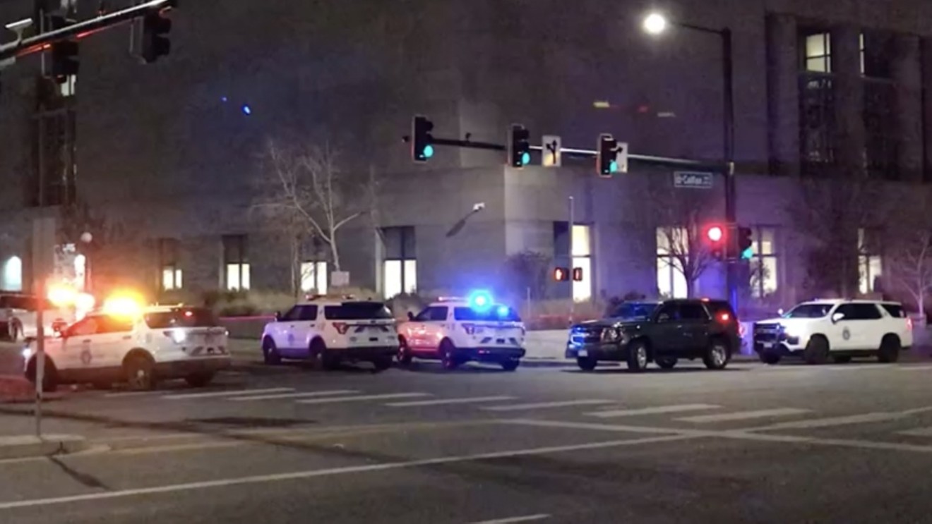 Police vehicles outside Denver's main jail after a November 28 shooting.