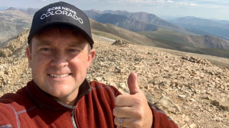 CBS4 Denver general manager Tim Wieland atop Mount Sherman last August.