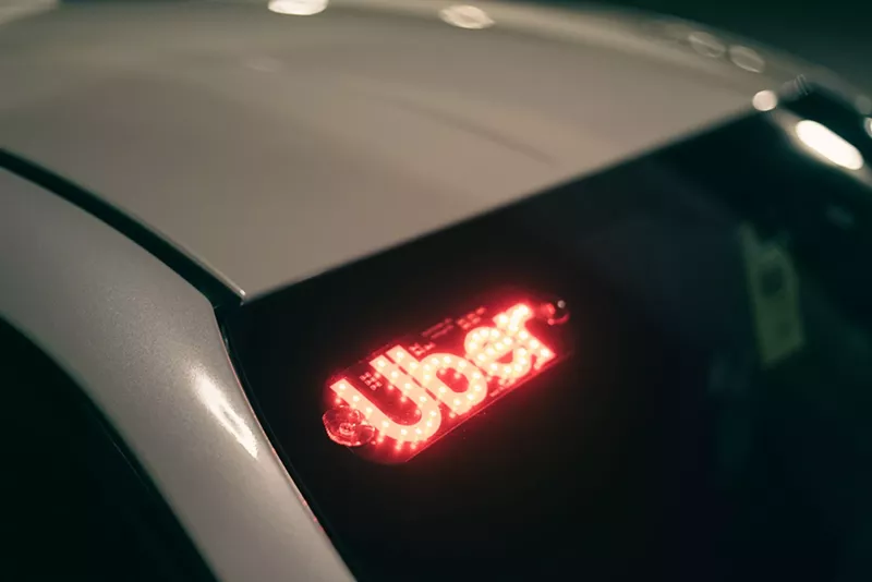 Image: Uber car with lit up sign