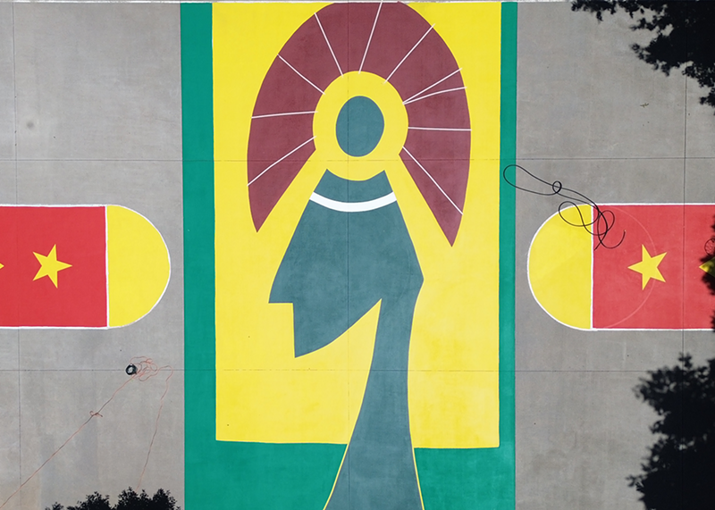 Jack Price II's new mural at Denver park City of Axum Park, in which Tigray flags flank an abstract representation of a king.