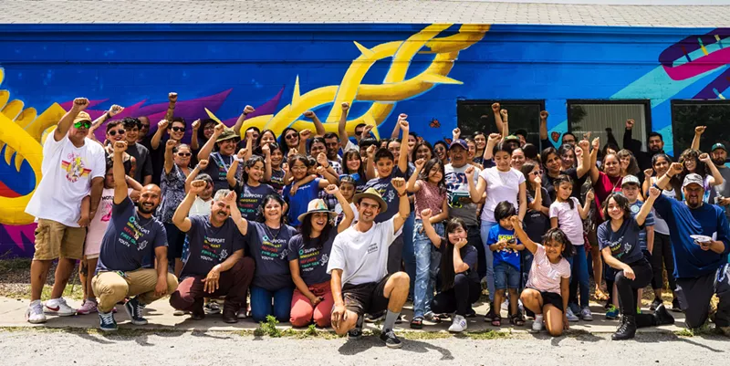 Image: Families of Convivir students at the mural unveiling.