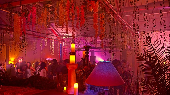 view of a dance floor with hanging plants