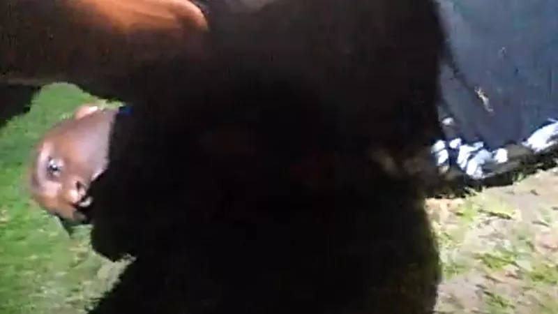Image: A screen capture from body-camera footage of Charles Ward, who is suing the City of Aurora and two police officers after being shot in the groin during a May 2020 incident.