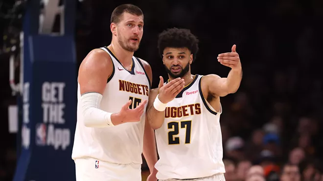 Nikola Jokic and Jamal Murray talk during game