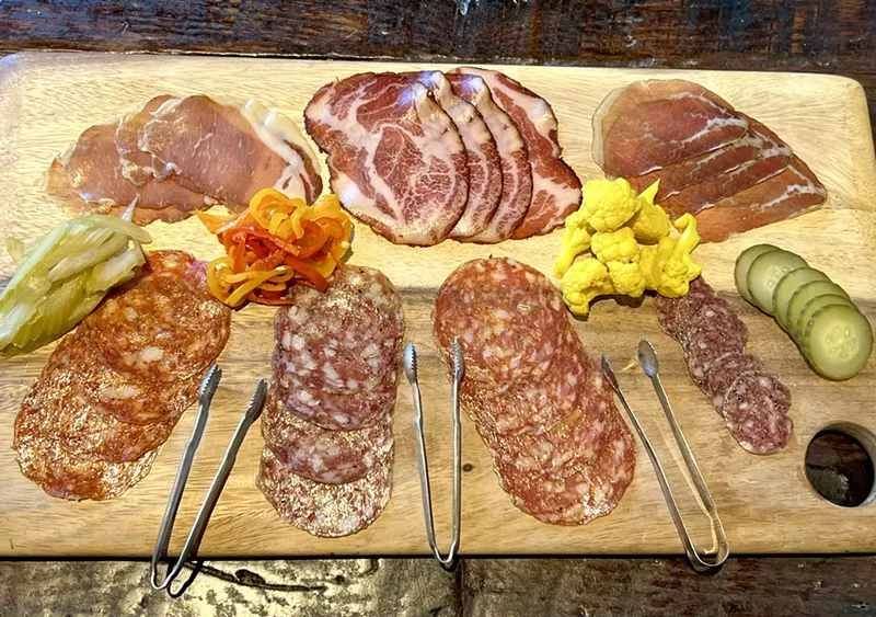 Image: A selection of Il Porcellino salumi and whole muscle cuts.