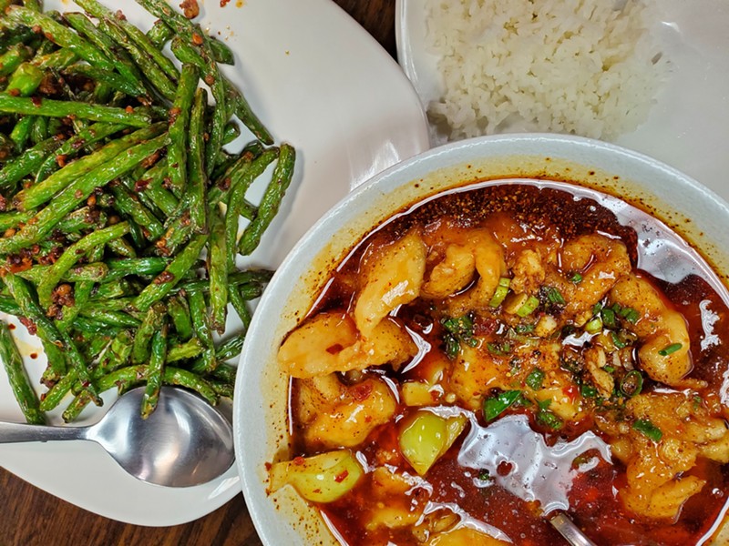 Szechuan-style fried green beans and spicy boiled fish from Noodles Express.