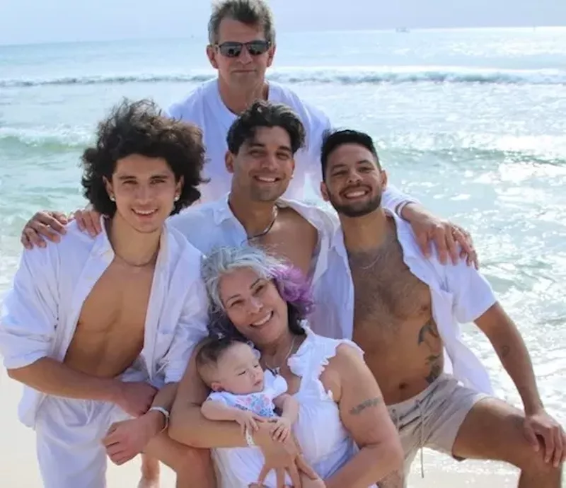 Image: family on beach with baby
