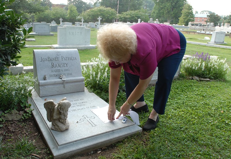 Lib Waters, a family friend of the Ramseys', visits the grave of JonBenét Ramsey in the early 2000s.