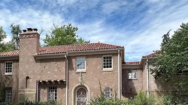 A large red-brick home.