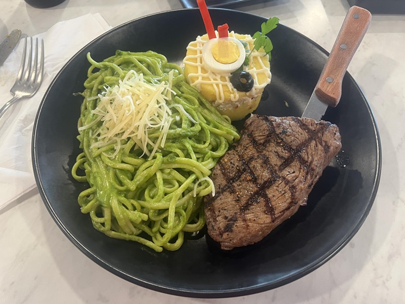 Churrasco (steak) and tallarin verde (a Peruvian persto pasta dish) at Rosario's