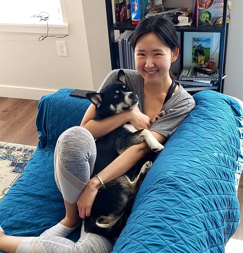 Image: Like many pet owners, Soo Cho sees her dog, Aspen, as a member of the family.