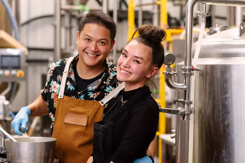 Image: man and woman in aprons