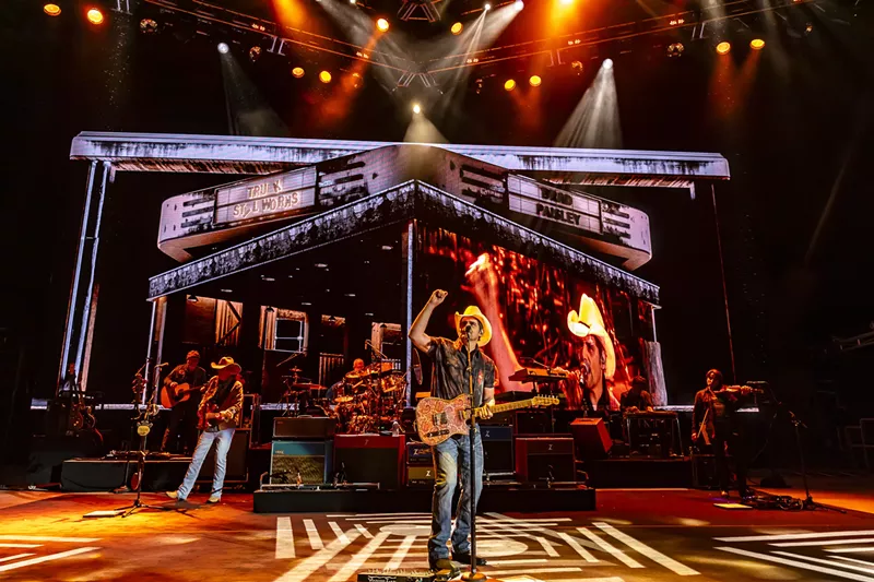 Image: A photo showing Brad Paisley on stage at Red Rocks with his full stage production behind him.