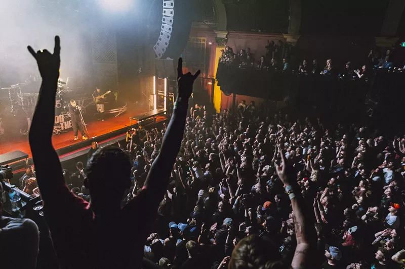 Image: A photo showing a packed Ogden Theatre.