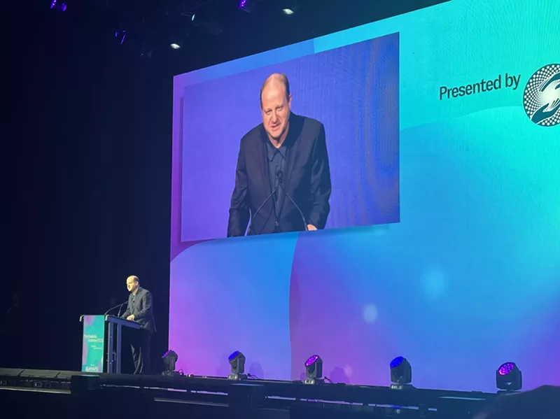 Image: Colorado Governor Jared Polis speaks at Psychedelic Science 2023 in Denver