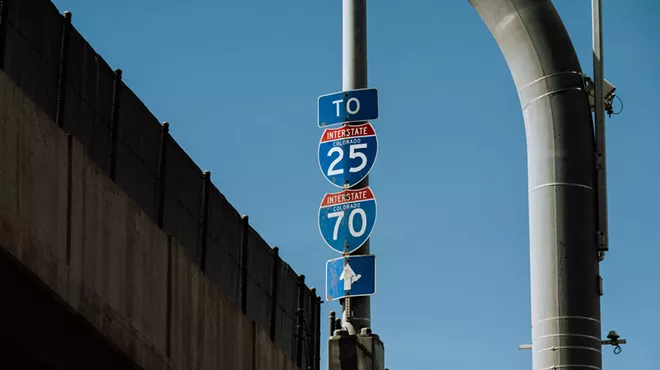 highway signs in Denver for I-25 and I-70