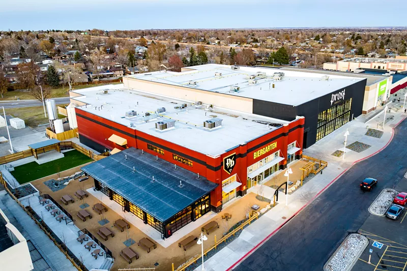 Image: the exterior of a large production brewery facility.