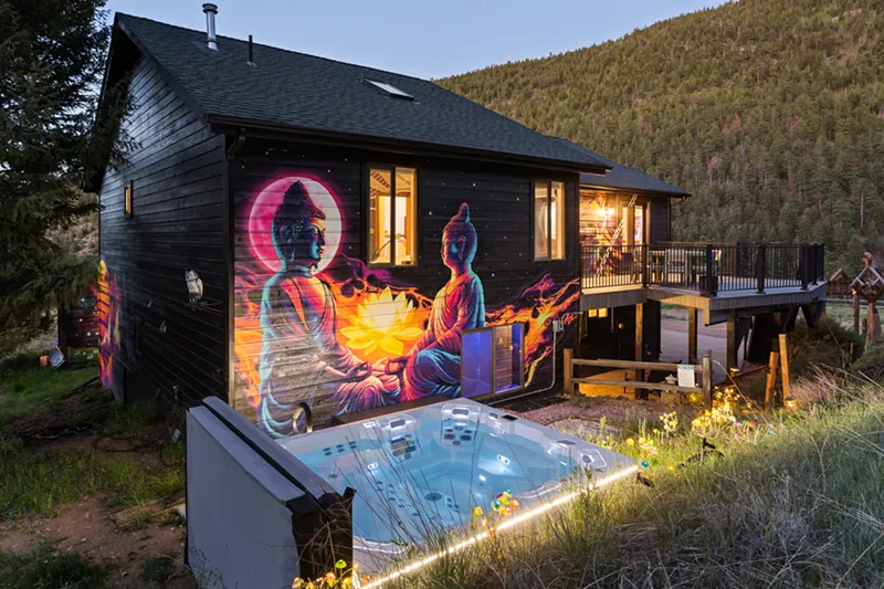 Image: A colorful mural and hot tub