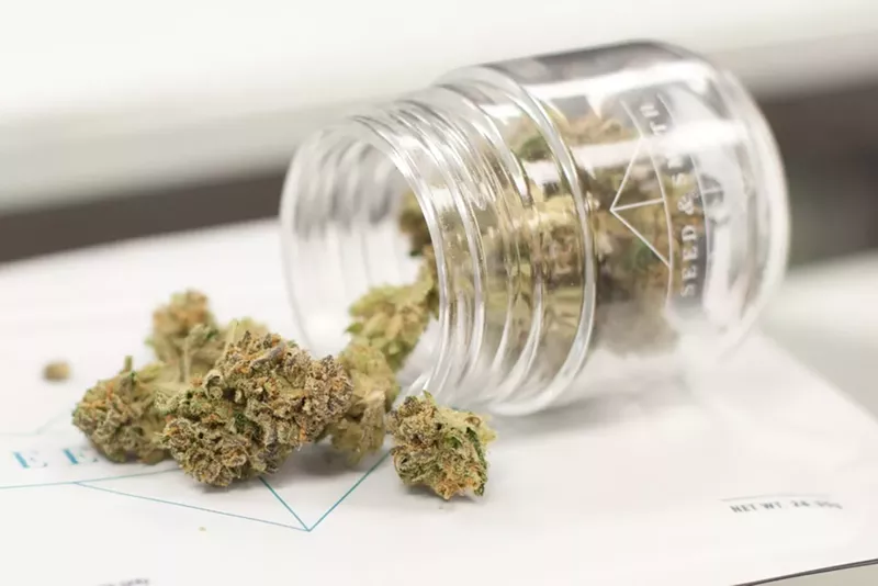 Image: Glass jar with cannabis buds