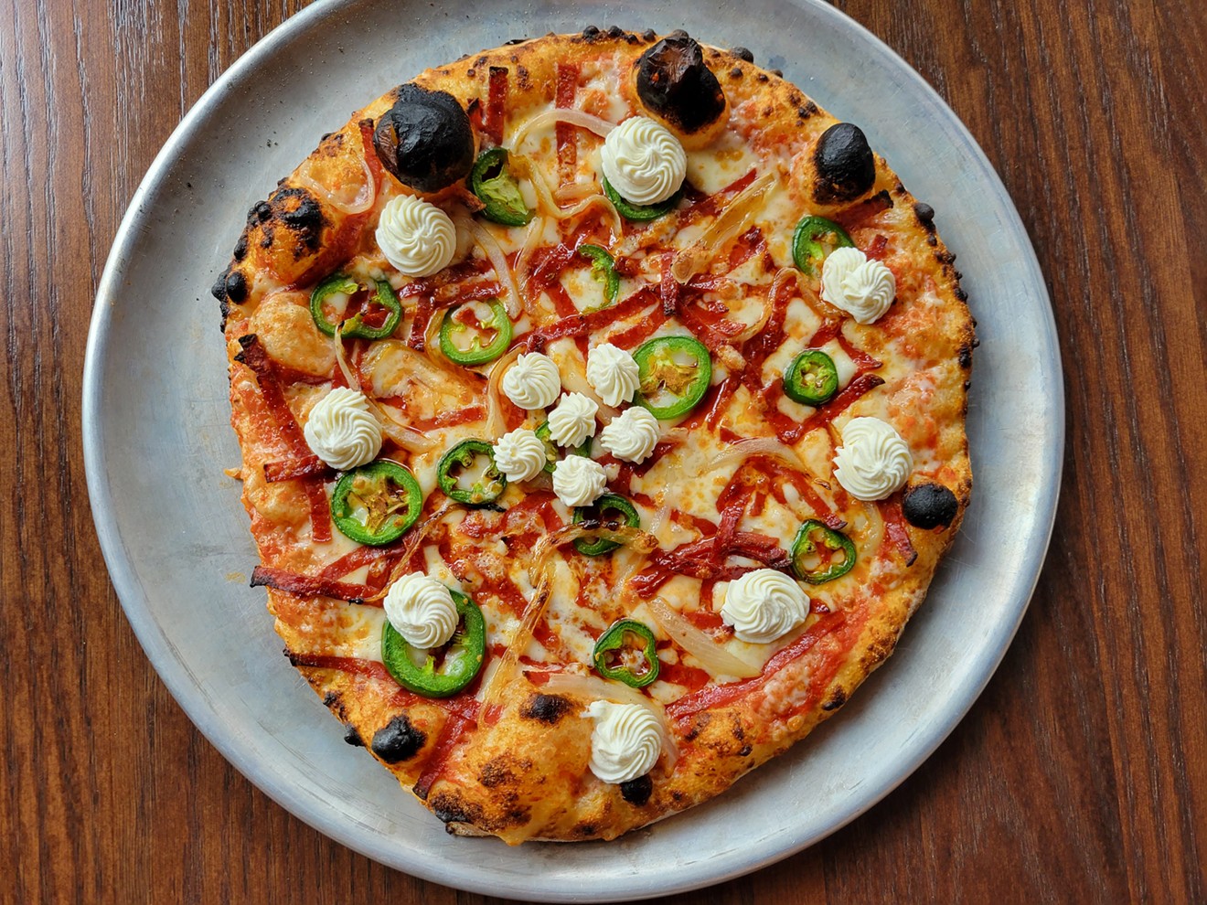 Quinto has created its own style of pizza.