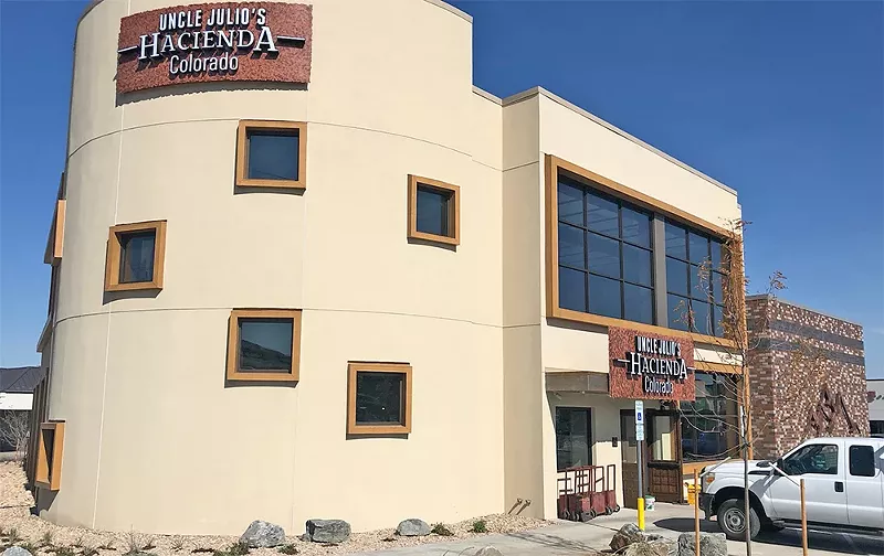 Image: exterior of a tan building
