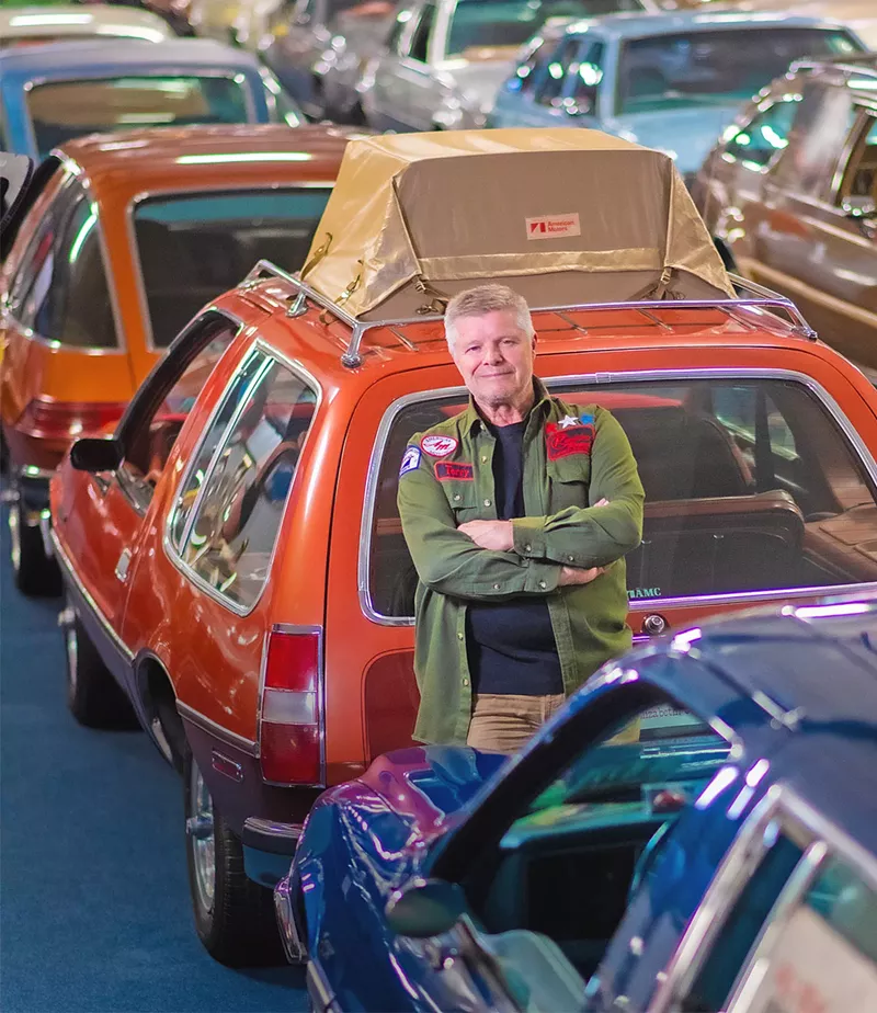 Image: man with AMC car at museum