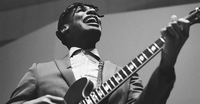 Image: man with guitar