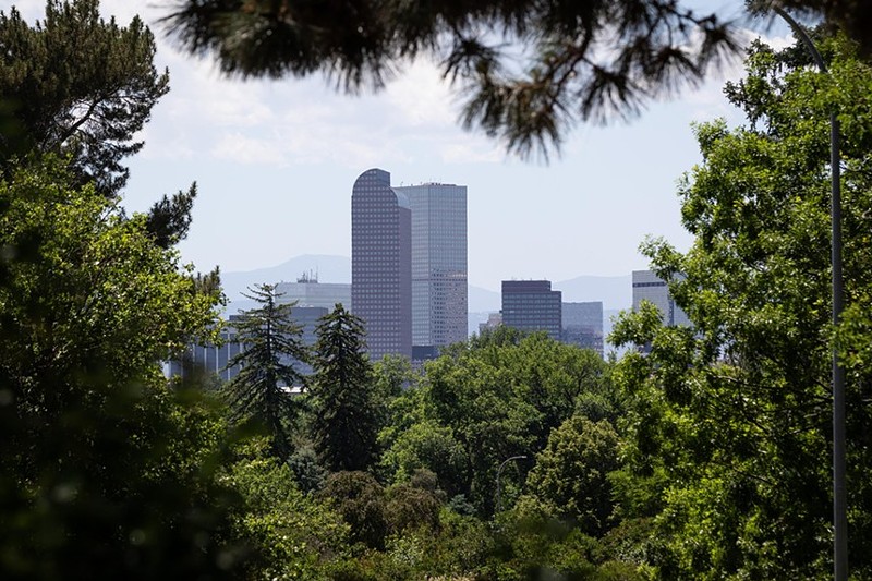 You can spot the Cash Register building through the trees by the Denver Museum of Nature & Science.
