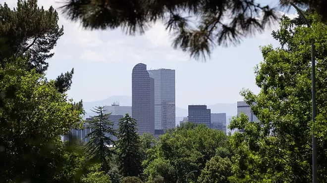view of building through trees