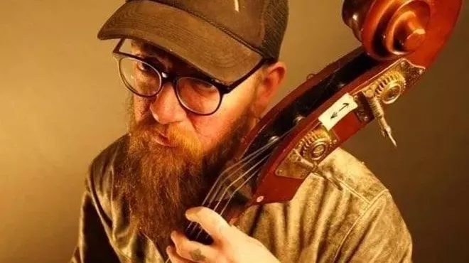 Geoff Robinson playing an upright bass