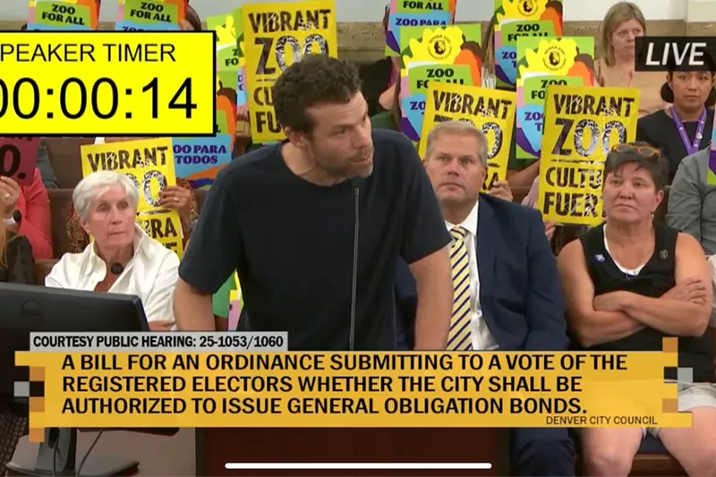Image: Avi Stopper speaks at a City Council hearing.
